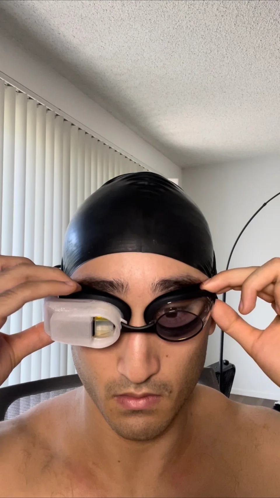 Sam checking the fit of an early movie-goggle display enclosure